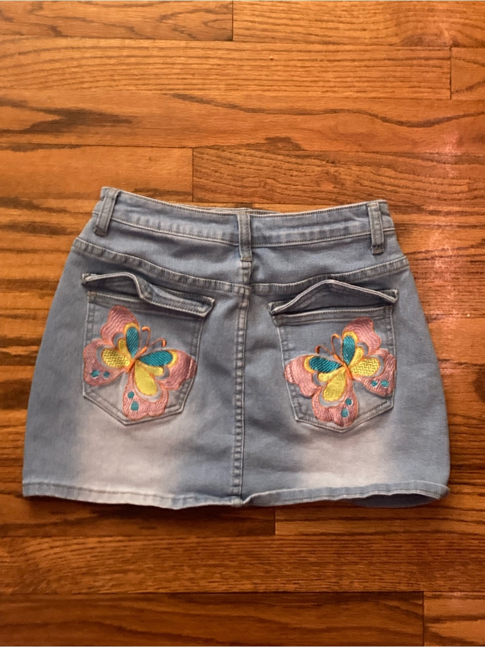 Embroidered butterfly denim mini skirt